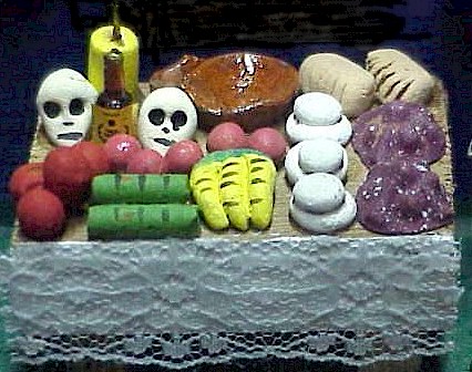 A closeup of an altar displayed in a shadowbox