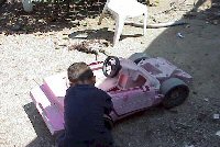 Child plays next to loser of fight