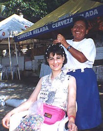 Amparo doing what she does best--little braids