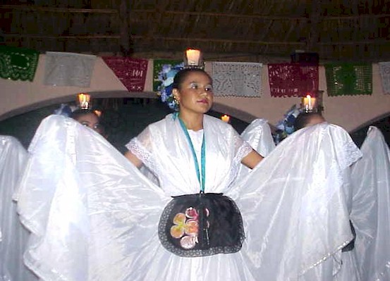 You try dancing with a candle on your head!