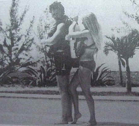 Carlos getting by with a little help from a "friend."