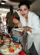 Estela serves to gringos at La Herradura in Minatitlan