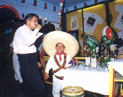 Carlos Cuellar, AKA "Hombre" enjoys a celebration drink