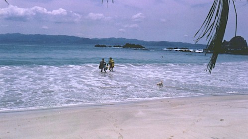 Divers entering the water at tenacatita, Mexico